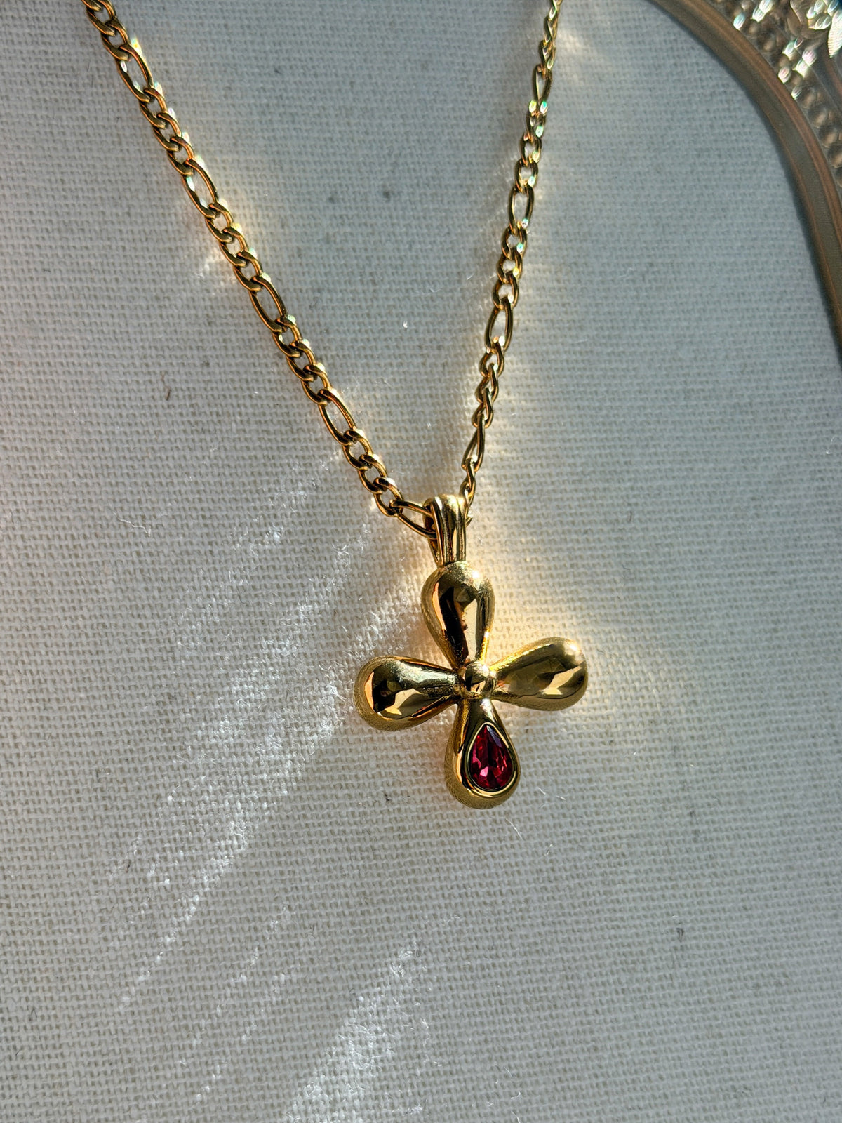 Gold Petal Cross Pendant Necklace with Red Crystal